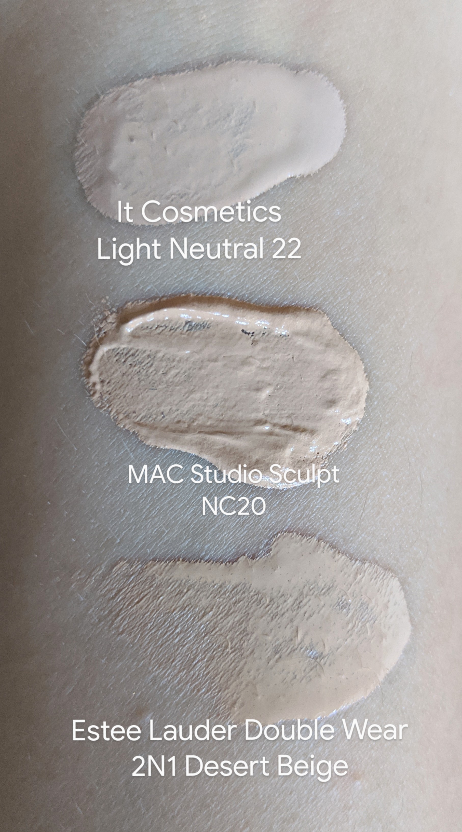 Michelle's foundation swatches from top to bottom: It Cosmetics Your Skin But Better Foundation + Skincare Light Neutral 22, MAC Studio Sculpt NC20, Estee Lauder Double Wear 2N1 Desert Beige